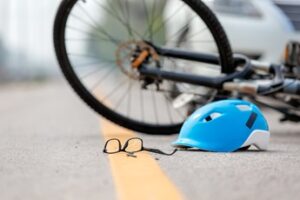 Accident car crash with bicycle on road