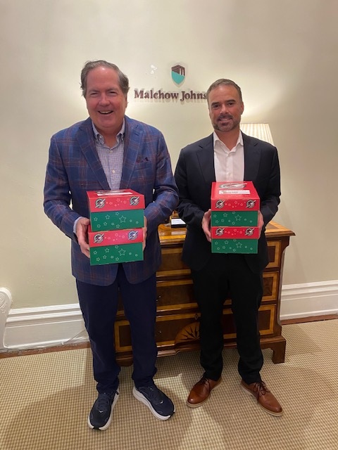 Sharing Joy Around the World: Our Team Donates Operation Christmas Child Shoeboxes